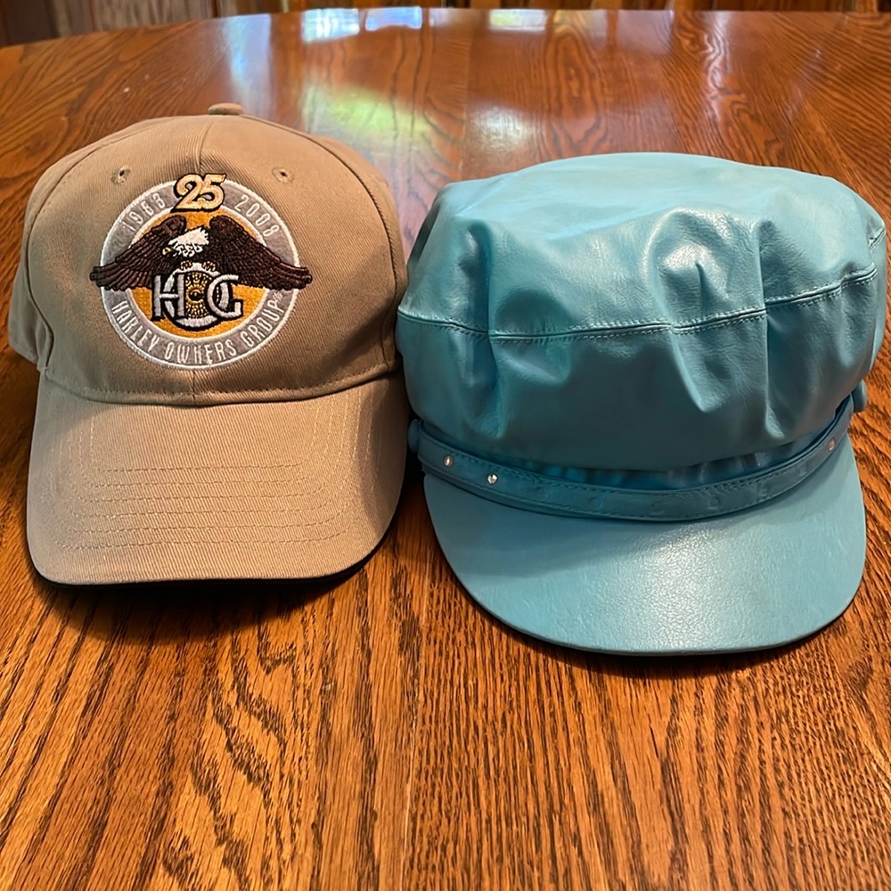One Harley HOG anniversary cap and riders cap.